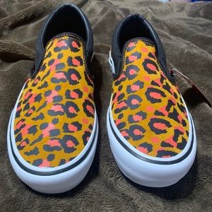 NEW WITH TAGS. Size 10.5 men and 12 Women Vans